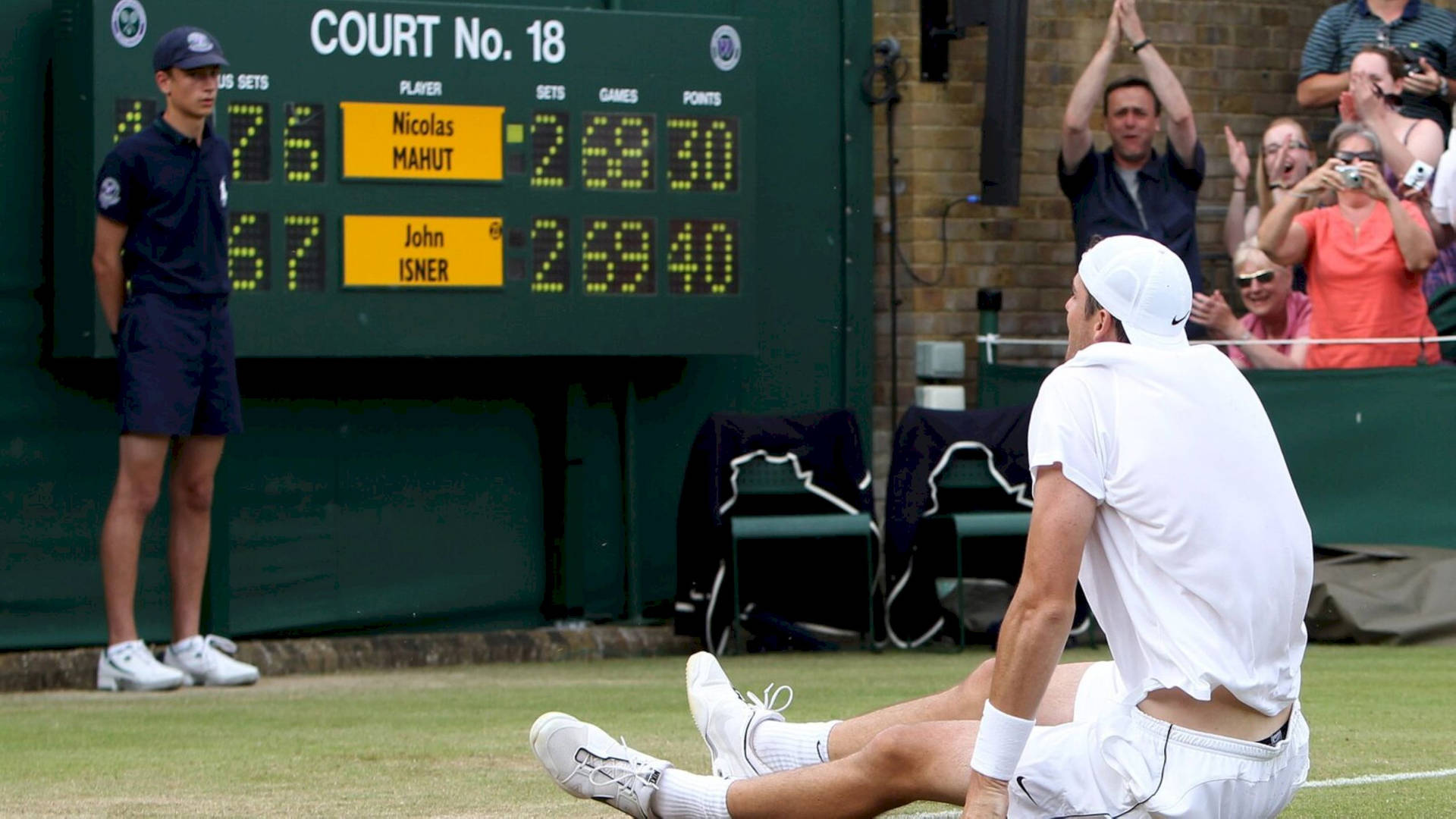 Nicolas Mahut Sitting On The Ground