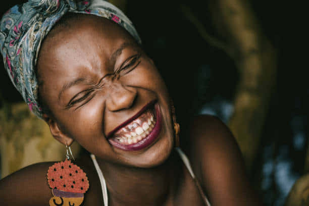 Nigerian Woman Happily Smiling Background