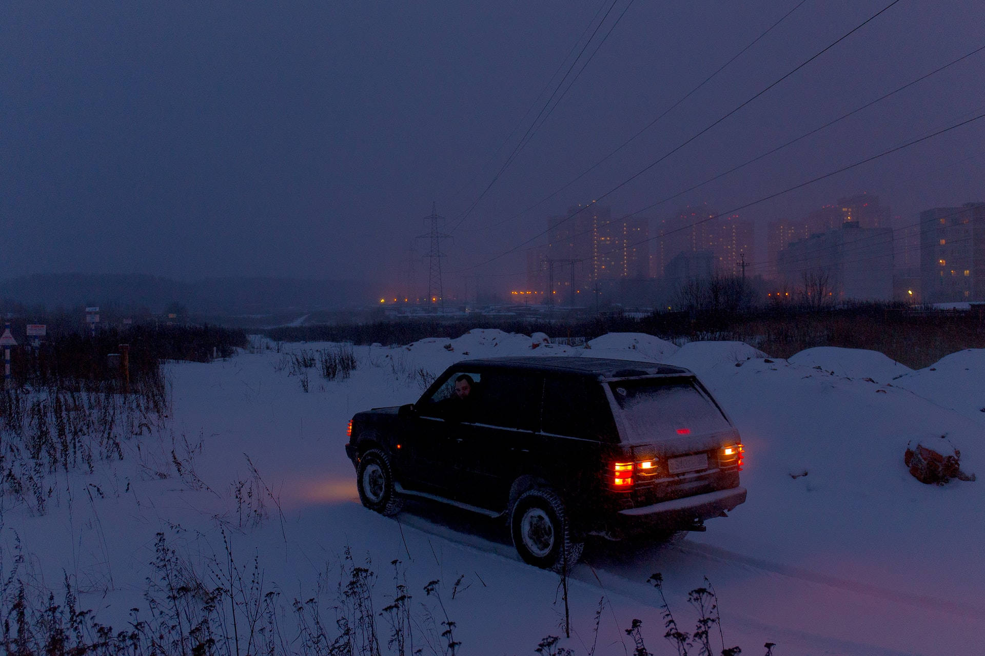 Night Aesthetic Parking On Snowy Road Background