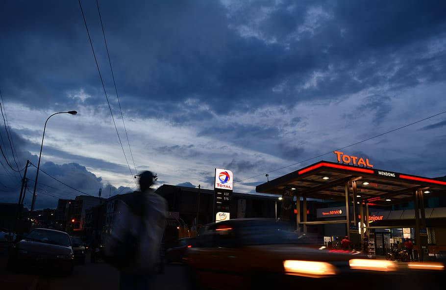 Night Photography Shot In Cameroon Total Gas Station Background