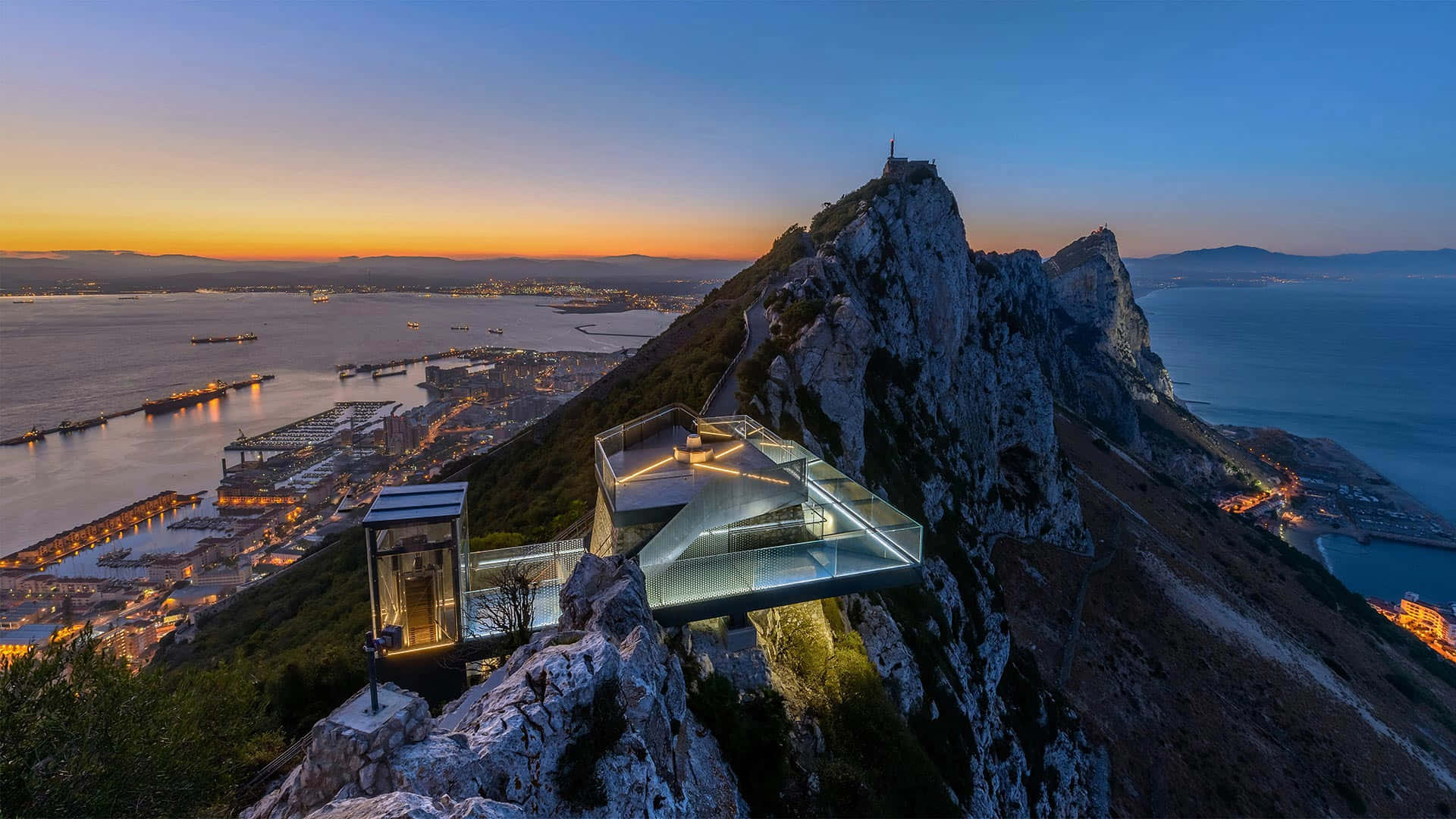 Night Sky Over The Majestic Rock Of Gibraltar Background