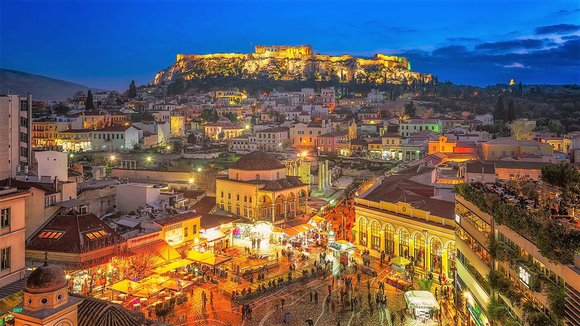 Night-time Panorama Of The Majestic Athens Acropolis Background