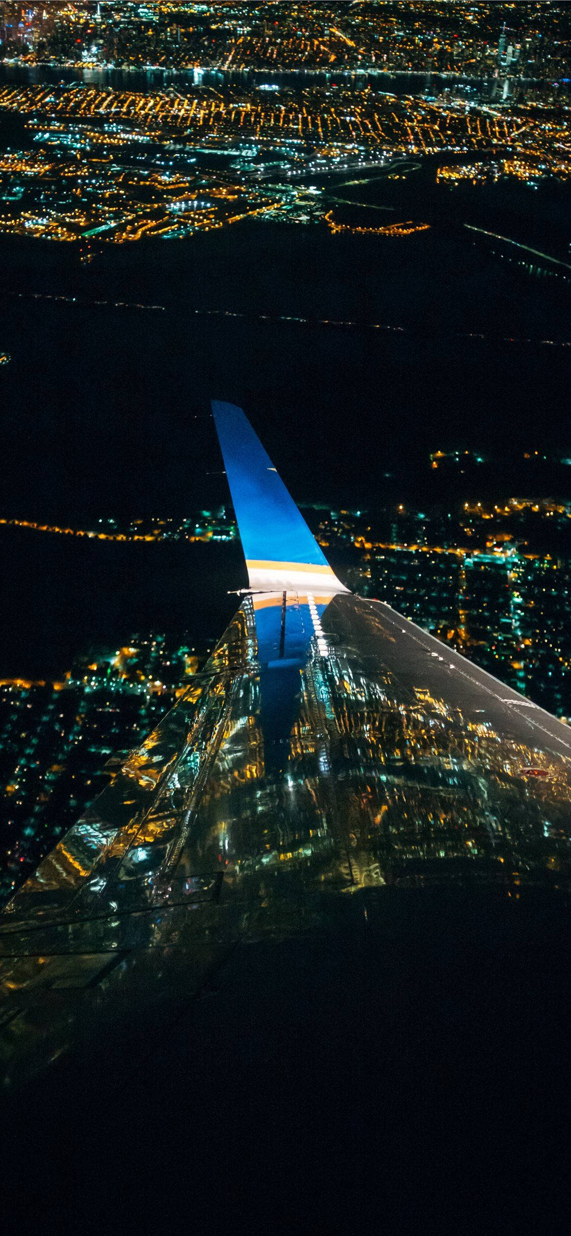 Night View Of Flying Airplane Android Background