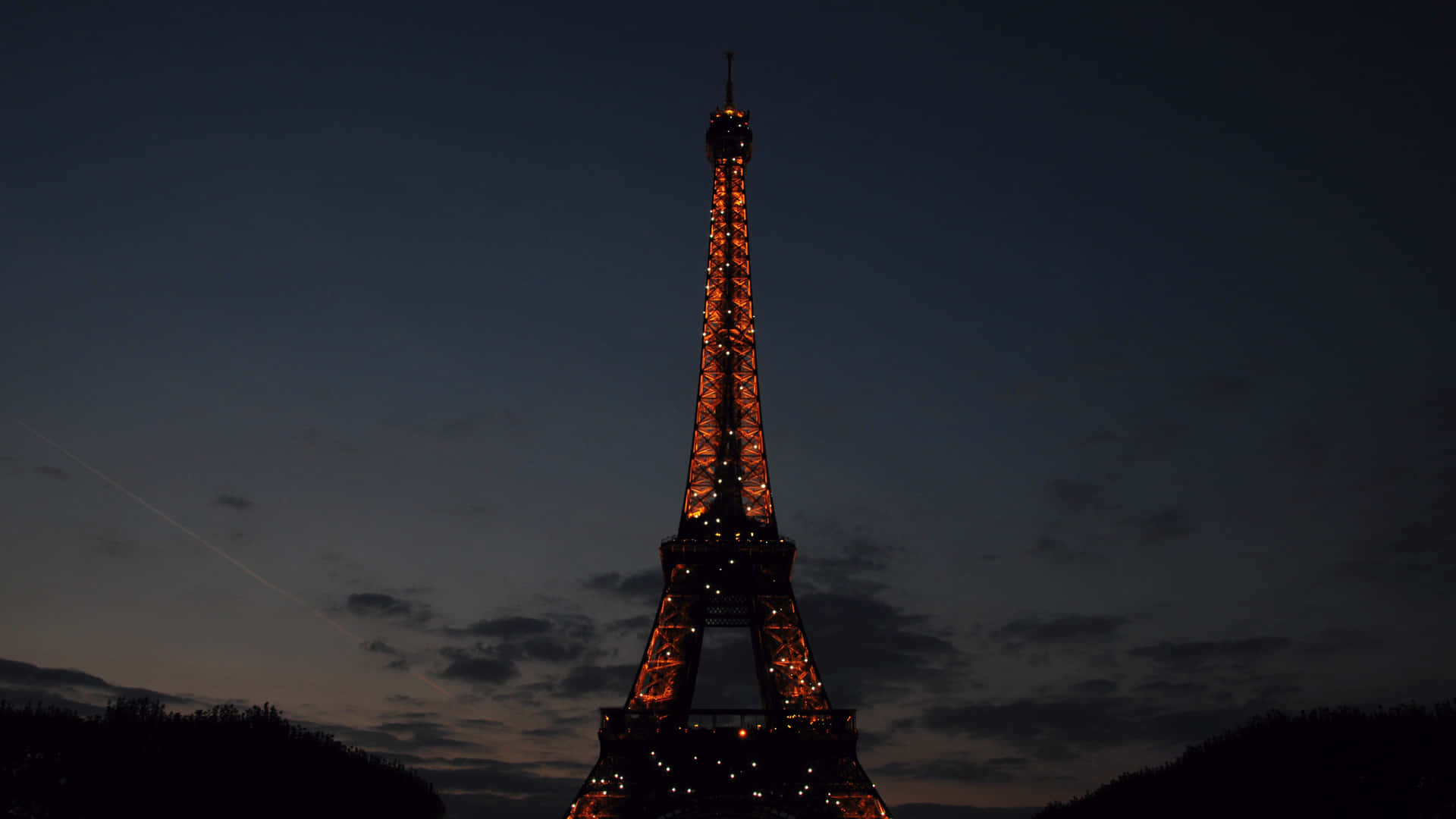 Night View Of Glowing Paris City Background