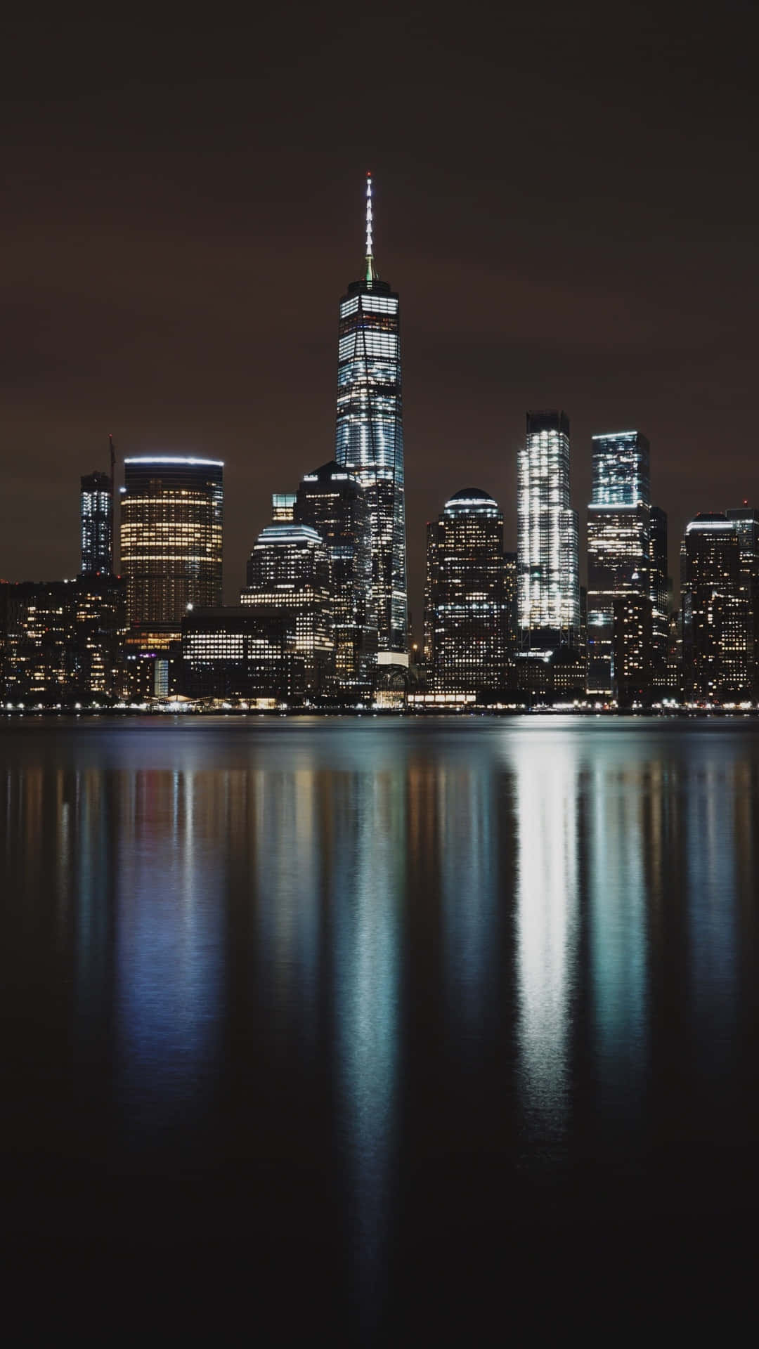 Night View Of New York City From Its Iconic Skyline Background