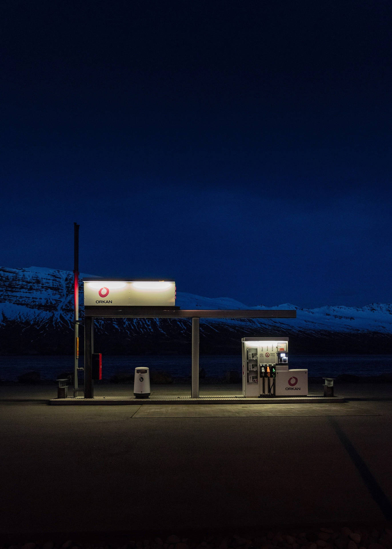 Nighttime At Orkan Gas Station Background