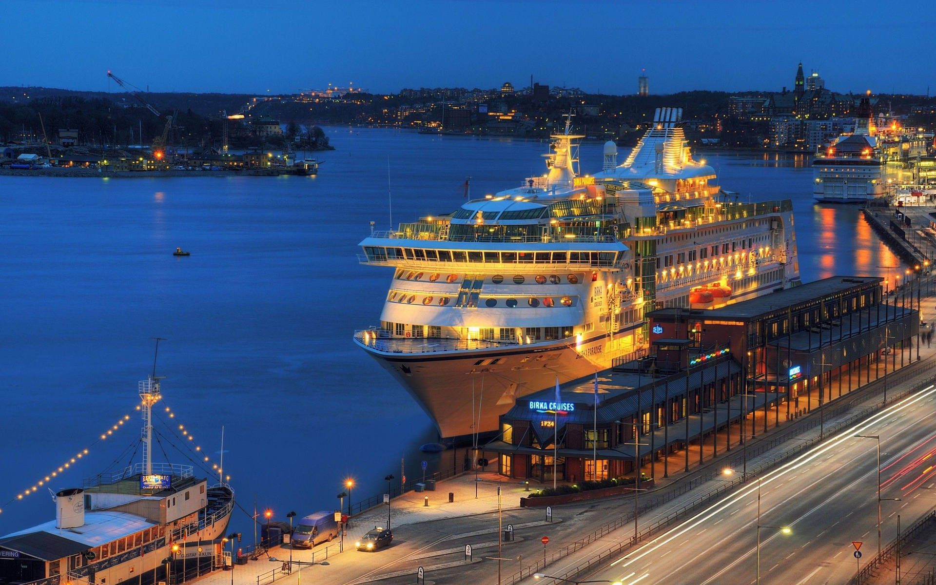 Nighttime Cruise Ship In Stockholm