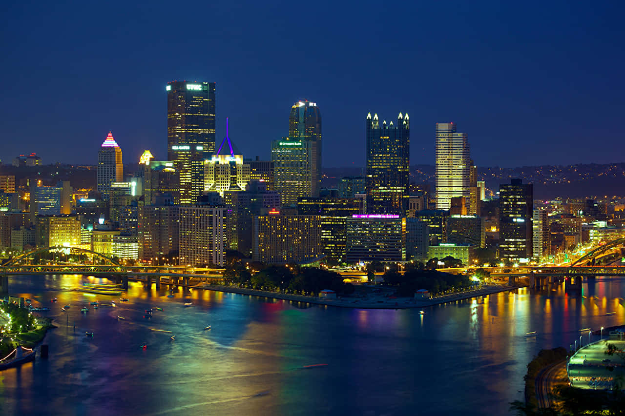 Nighttime Pittsburgh Skyline Background