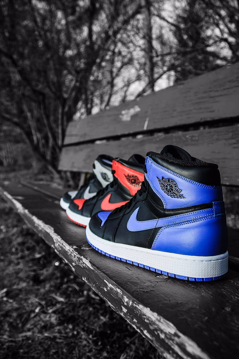 Nike Air Jordan 1 Sneakers On A Bench Background