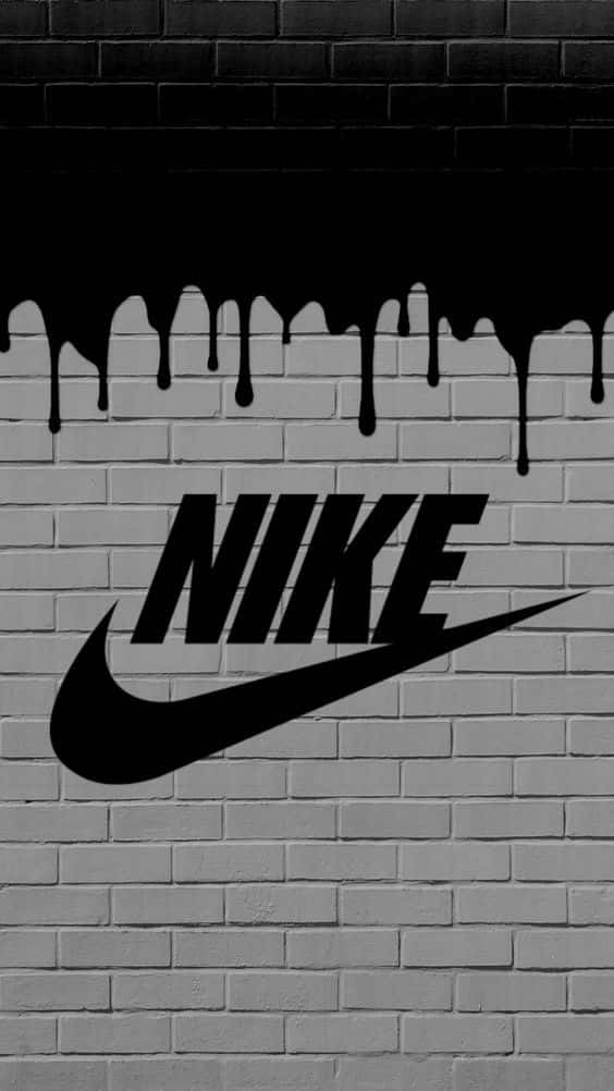 Nike Logo On A Brick Wall