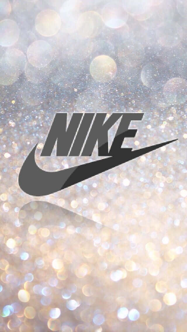 Nike Logo On A Glittery Background Background