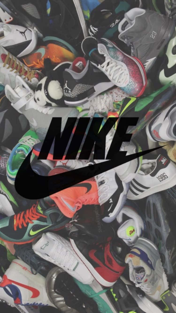 Nike Shoes Are Piled Up In A Pile Background