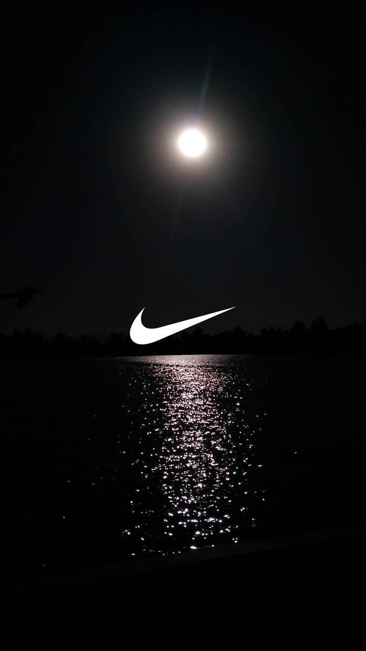 Nike Swoosh In The Night Sky Background