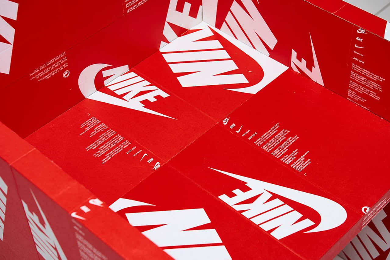 Nike Swoosh Logos On A Red Box Background