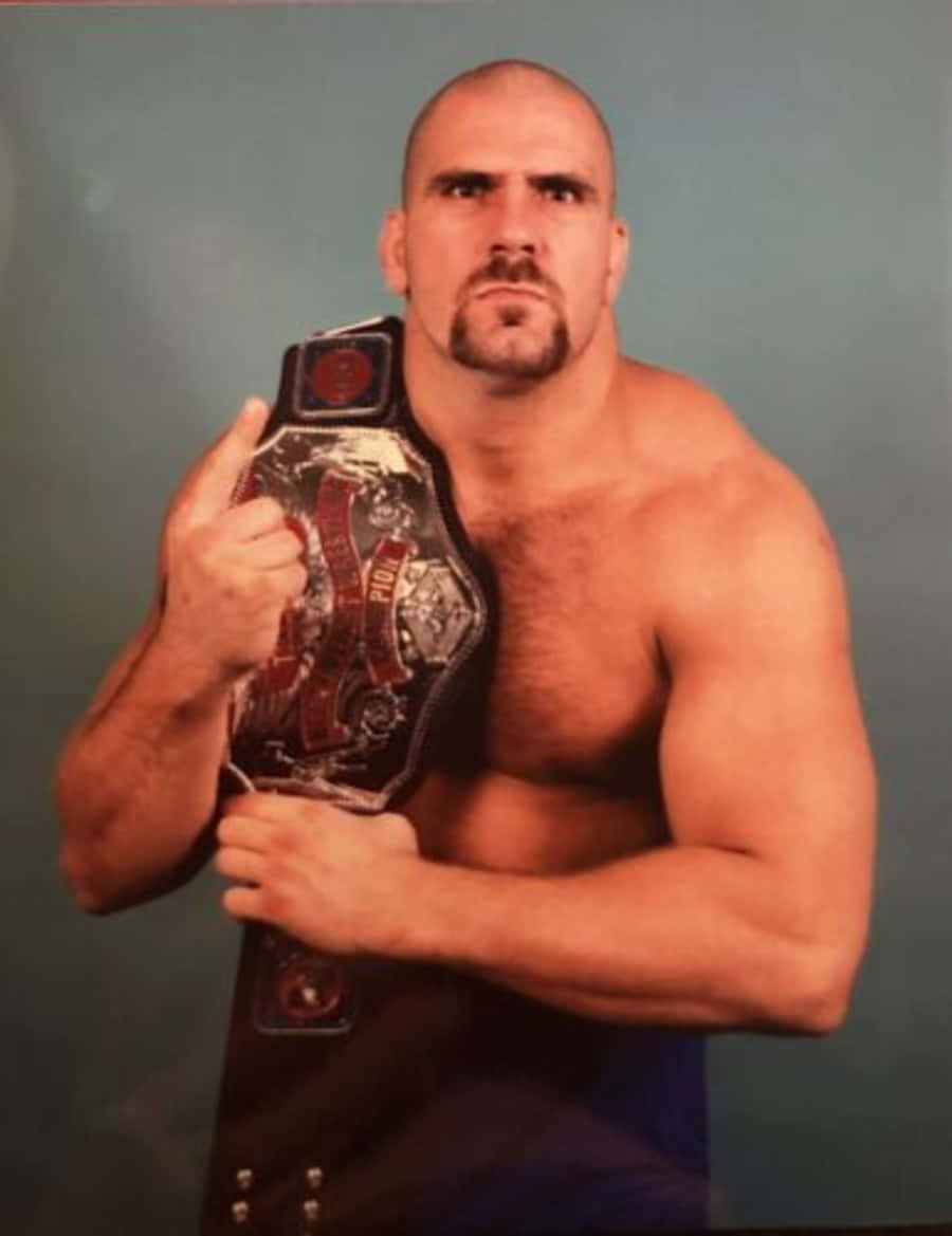Nikita Koloff With His Belt On Shoulder Background