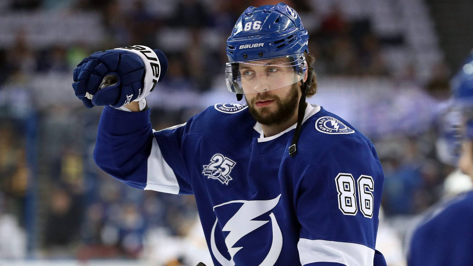 Nikita Kucherov Holding Hockey Puck Background