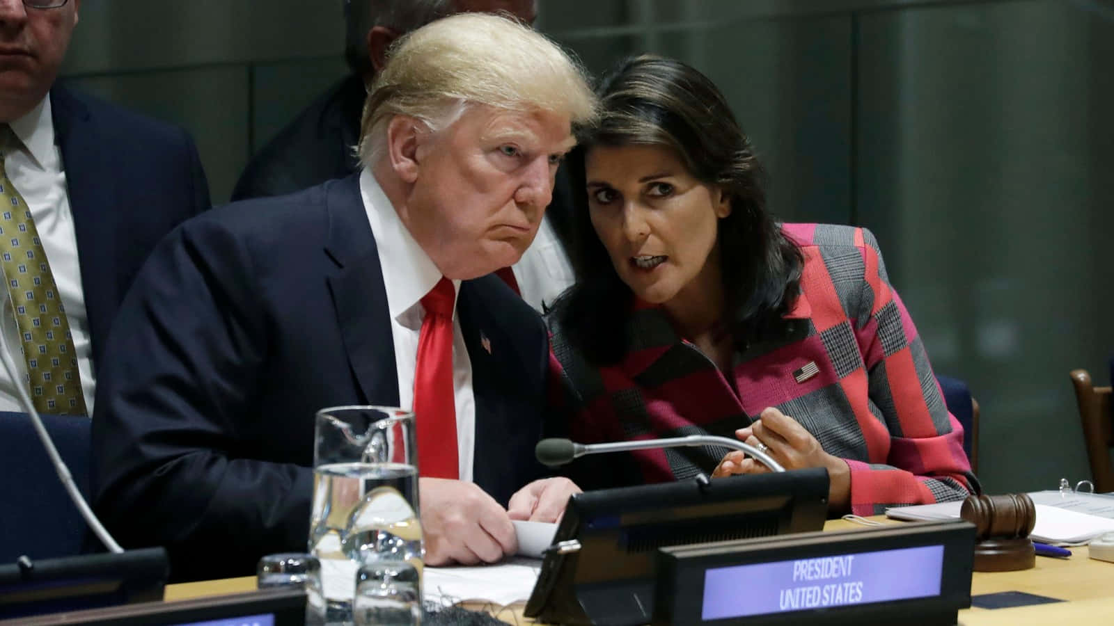 Nikki Haley And Donald Trump At A Formal Event Background