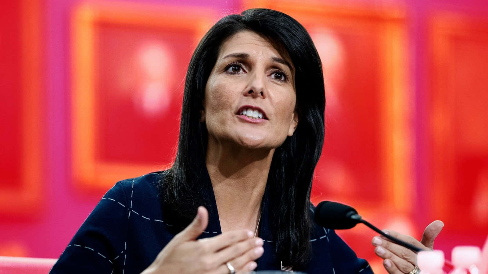 Nikki Haley Delivering A Speech Background
