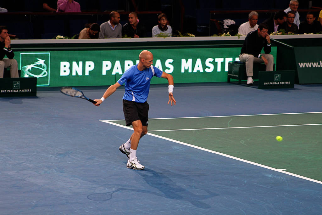 Nikolay Davydenko In Action At Indian Wells Open Background