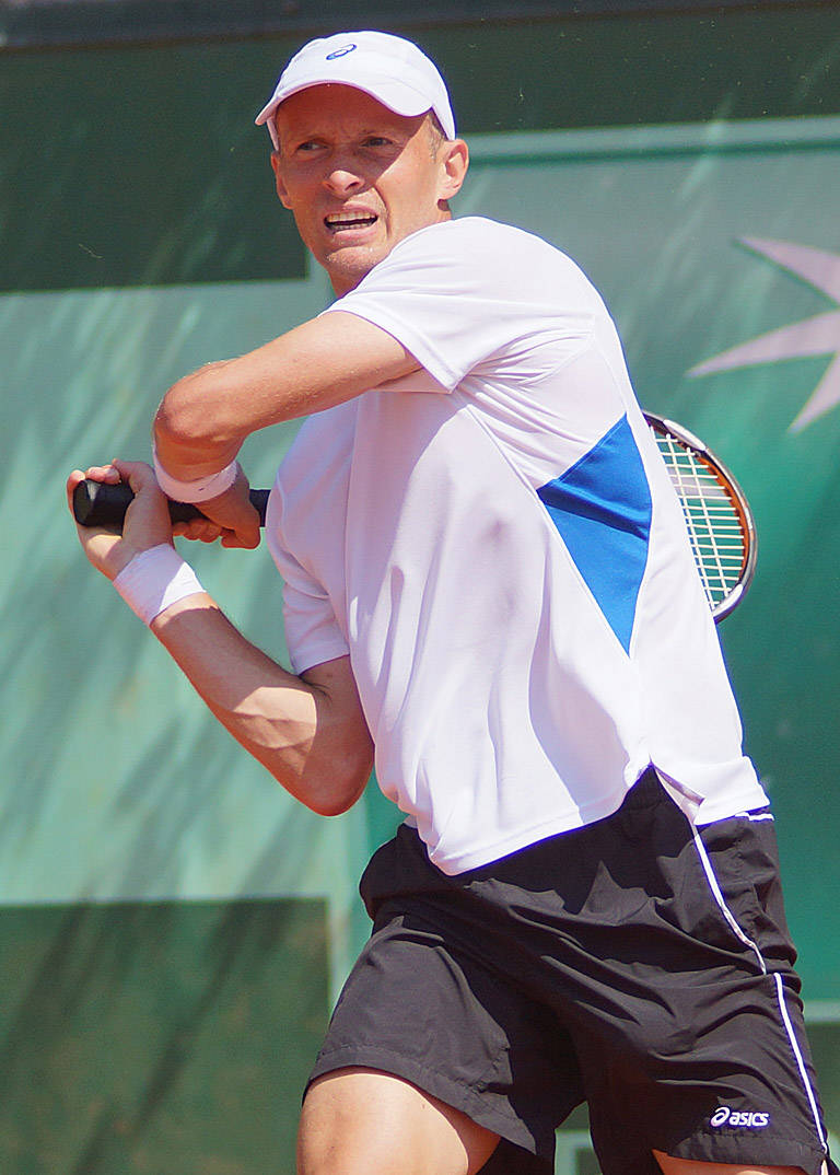 Nikolay Davydenko Practicing Tennis Strokes Background