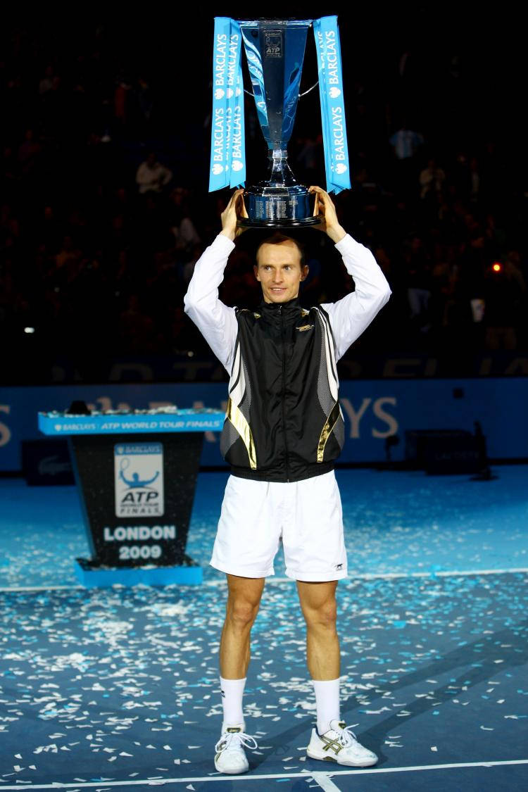 Nikolay Davydenko Raising Atp Trophy Background