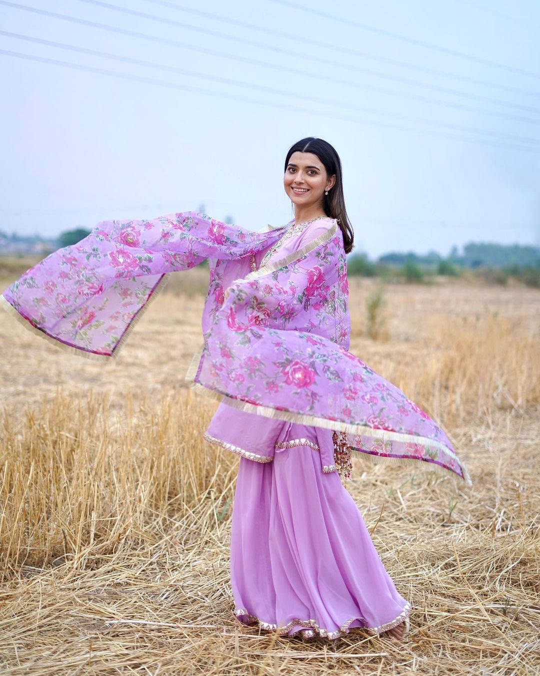 Nimrat Khaira In Field Background