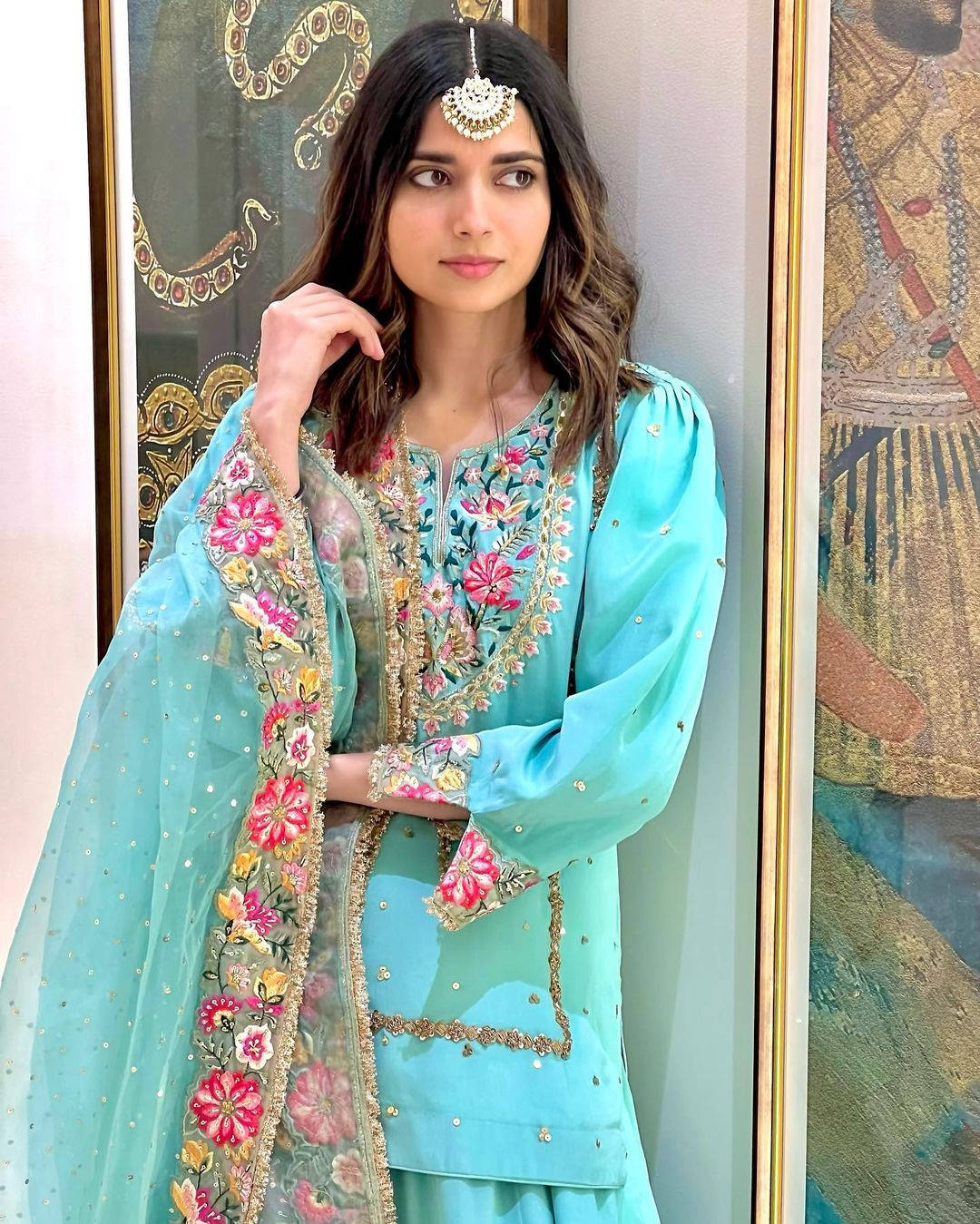 Nimrat Khaira In Teal Background