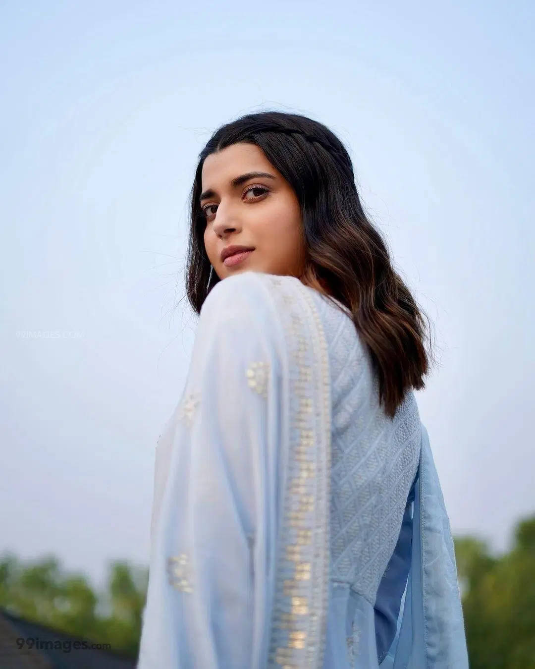 Nimrat Khaira Over Shoulder Background