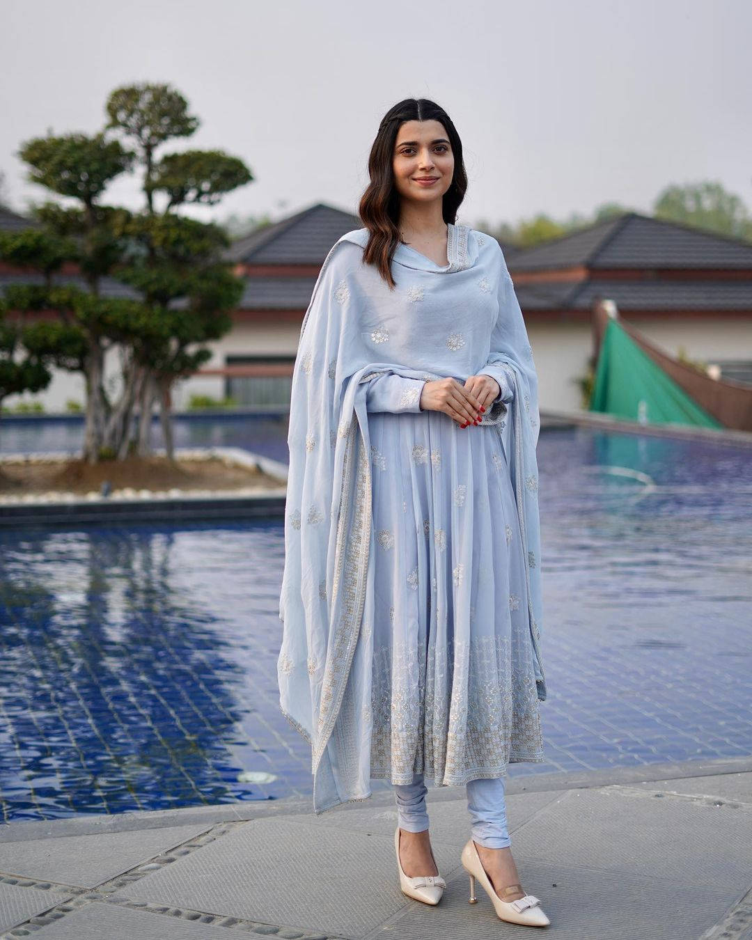 Nimrat Khaira Relaxing By The Poolside Background