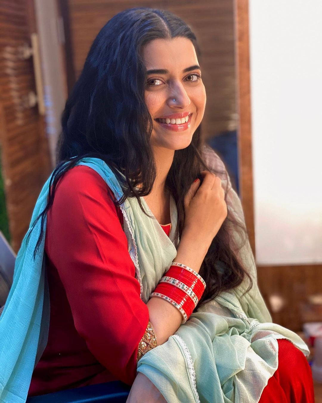 Nimrat Khaira Smiling Background