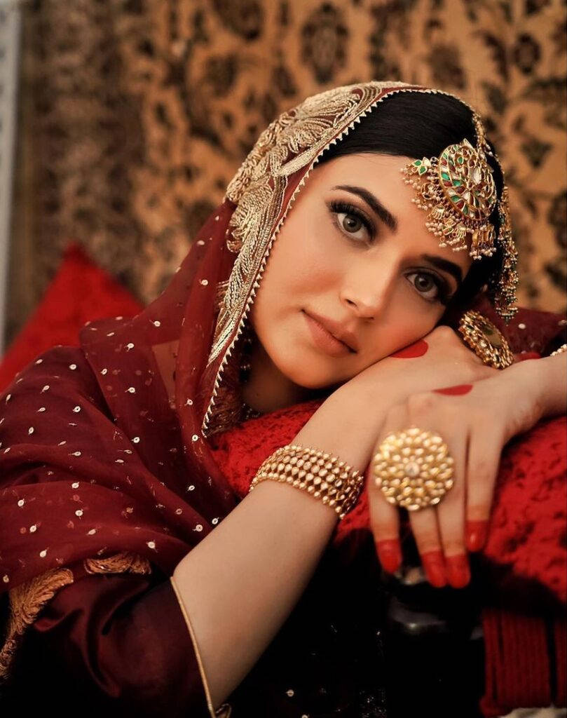 Nimrat Khaira With Gold Jewelry Background