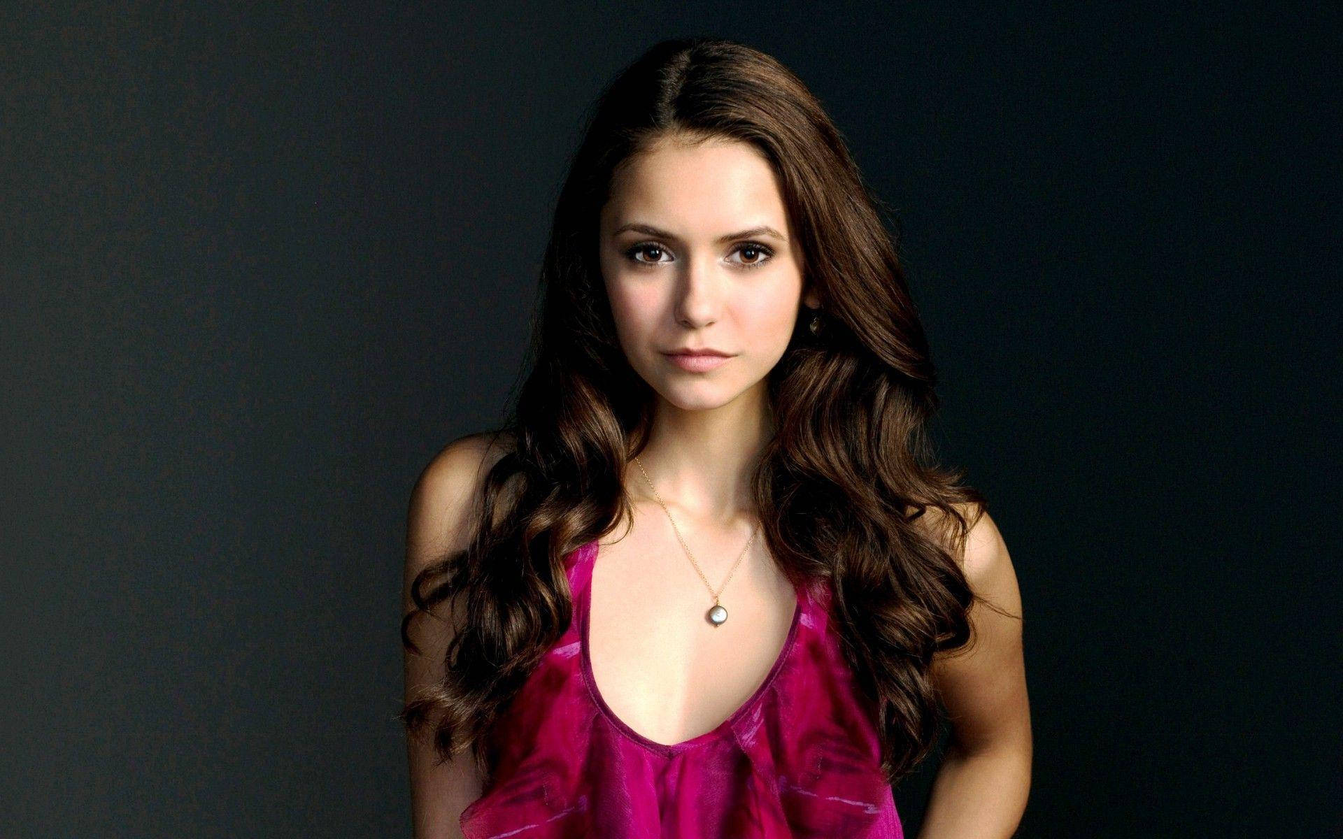 Nina Dobrev In Pink Background