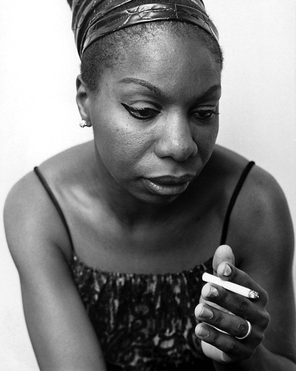 Nina Simone Smoking Cigarette Pose Background