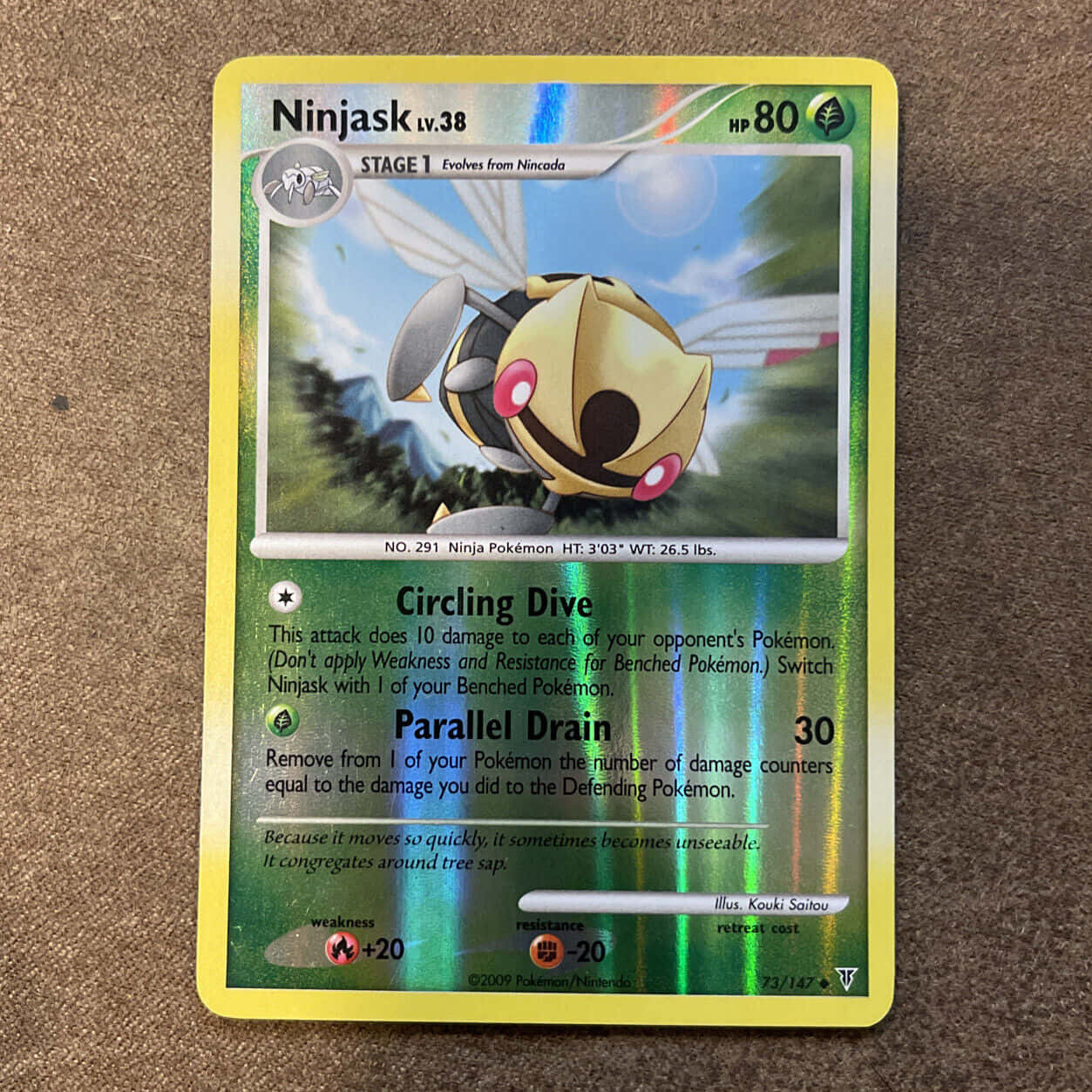 Ninjask Trading Card Brown Table Background