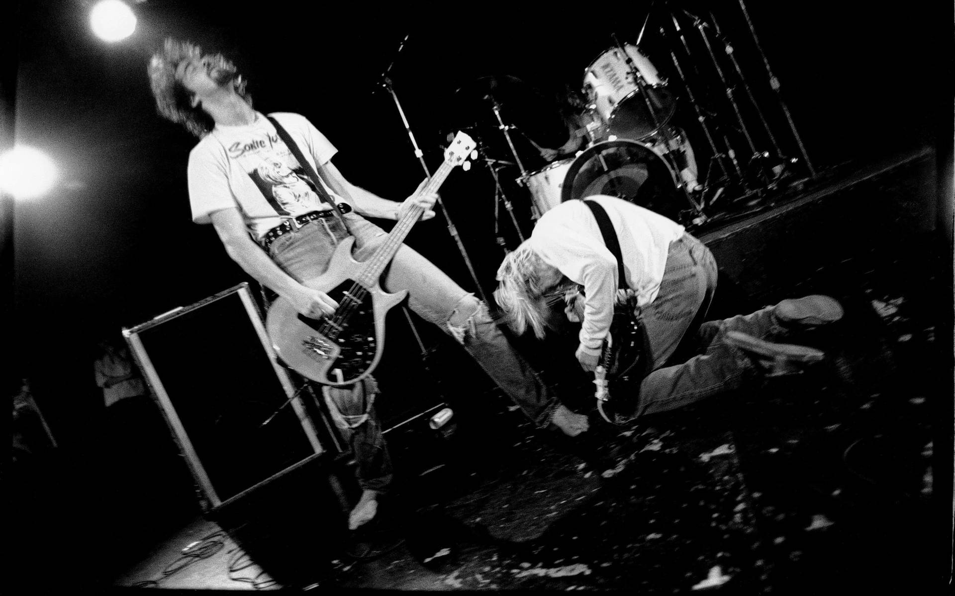 Nirvana Members Playing Guitar Background