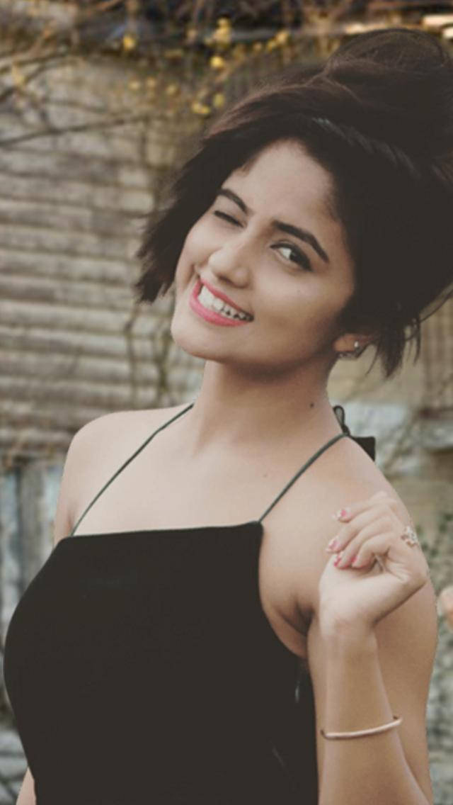 Nisha Guragain Dressed In Black Top Background