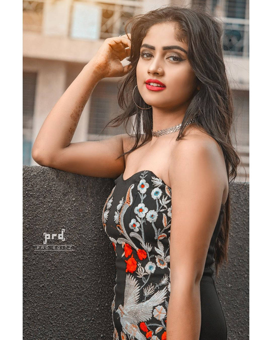 Nisha Guragain In Floral Sleeveless Top Background