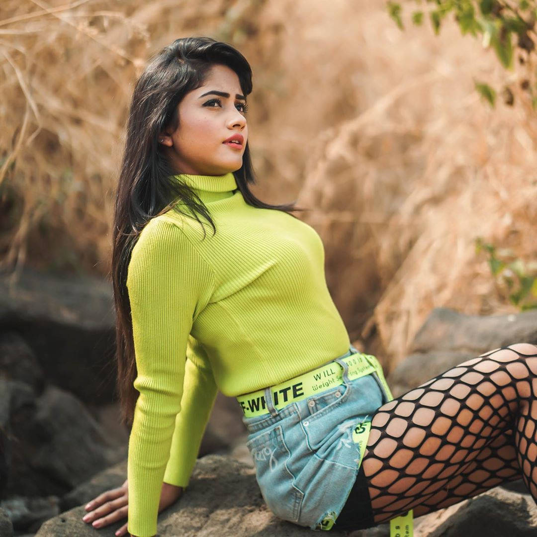 Nisha Guragain In Green Top Outfit Background