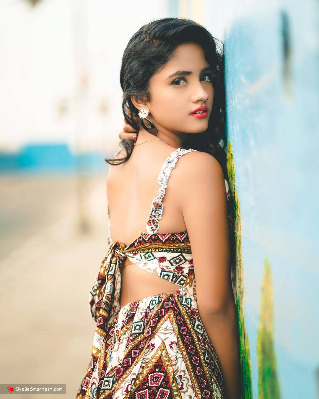 Nisha Guragain Wearing Backless Dress Background
