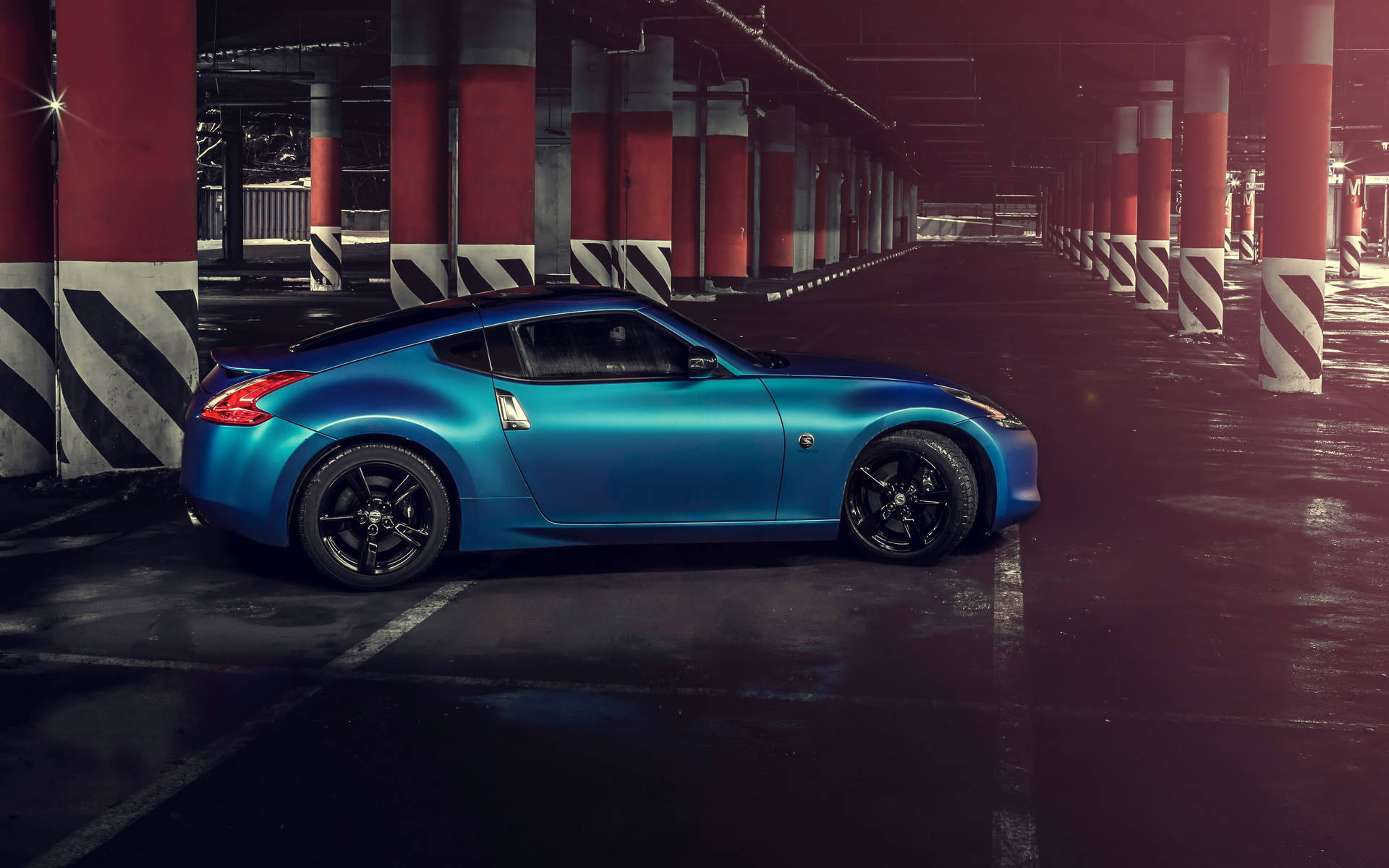 Nissan 370z Exiting The Parking Space Background