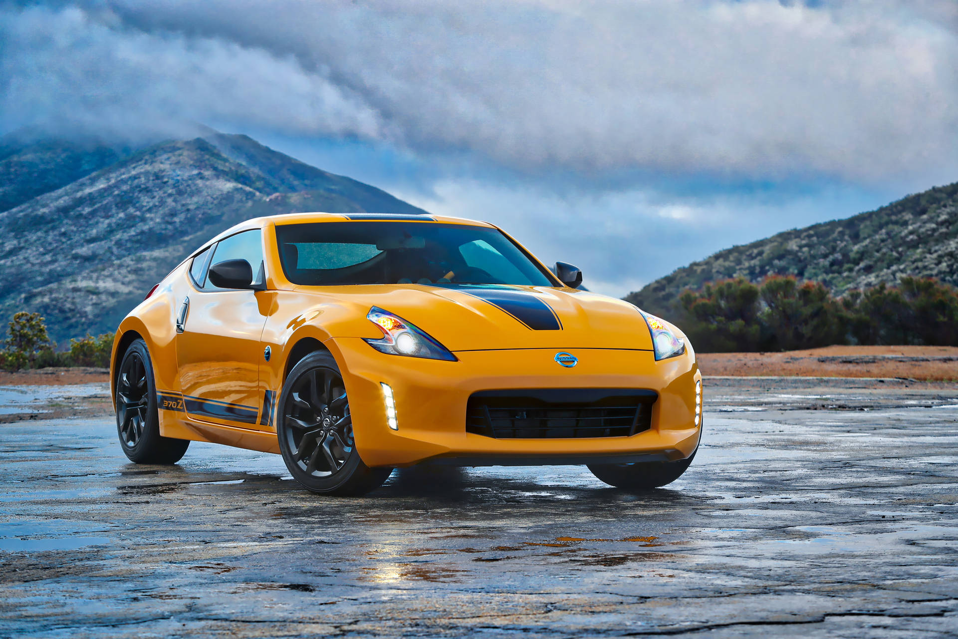 Nissan 370z With A Black-striped Hood Background