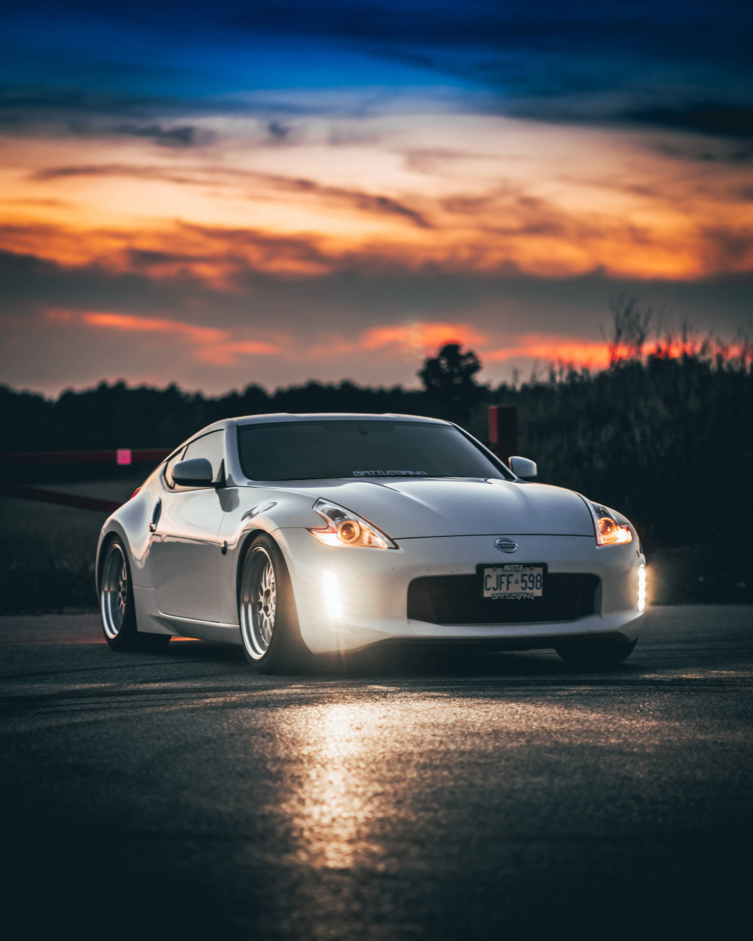 Nissan 370z With Orange Skies Background