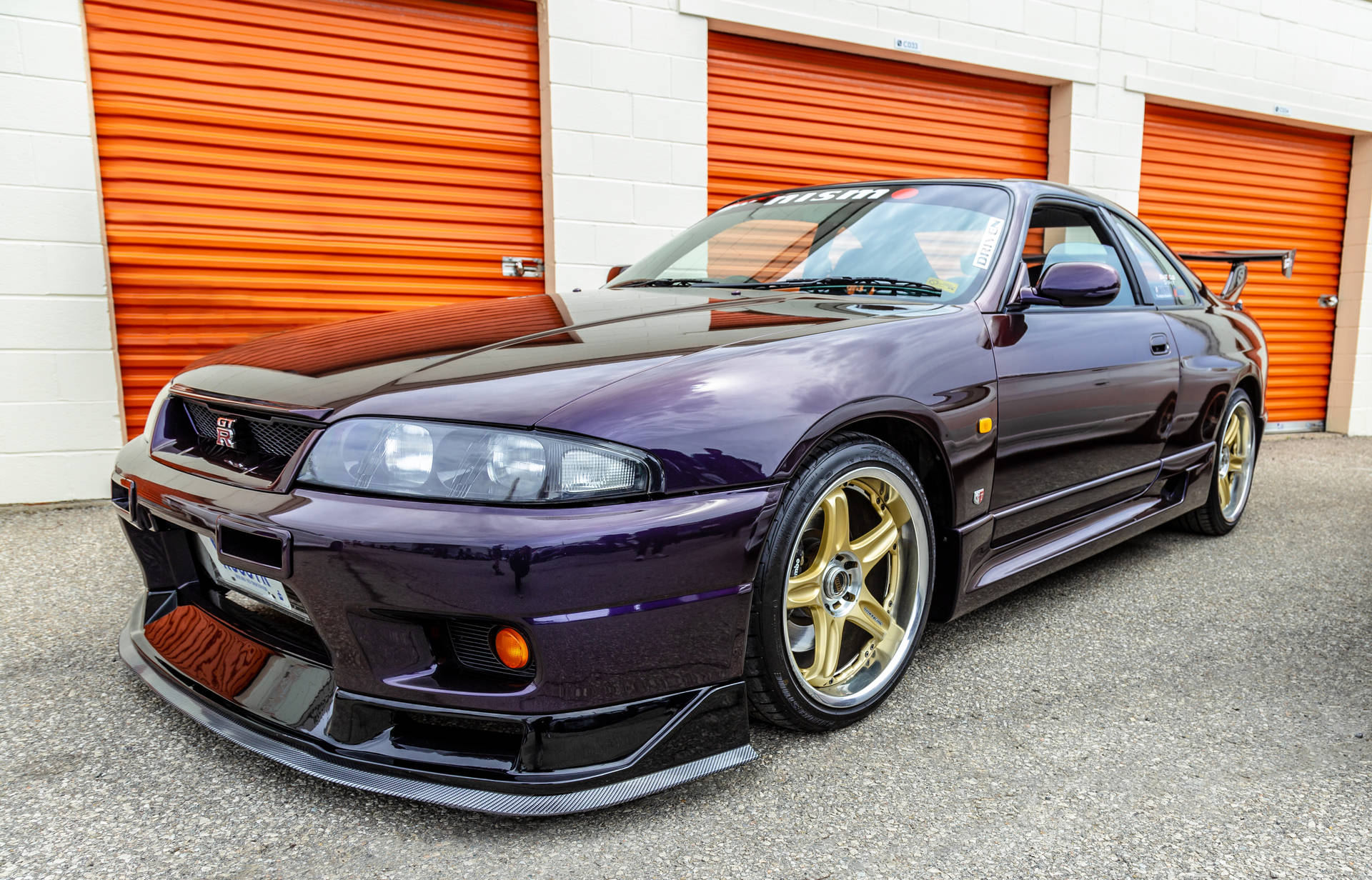 Nissan Gt R With Gold Rims Background
