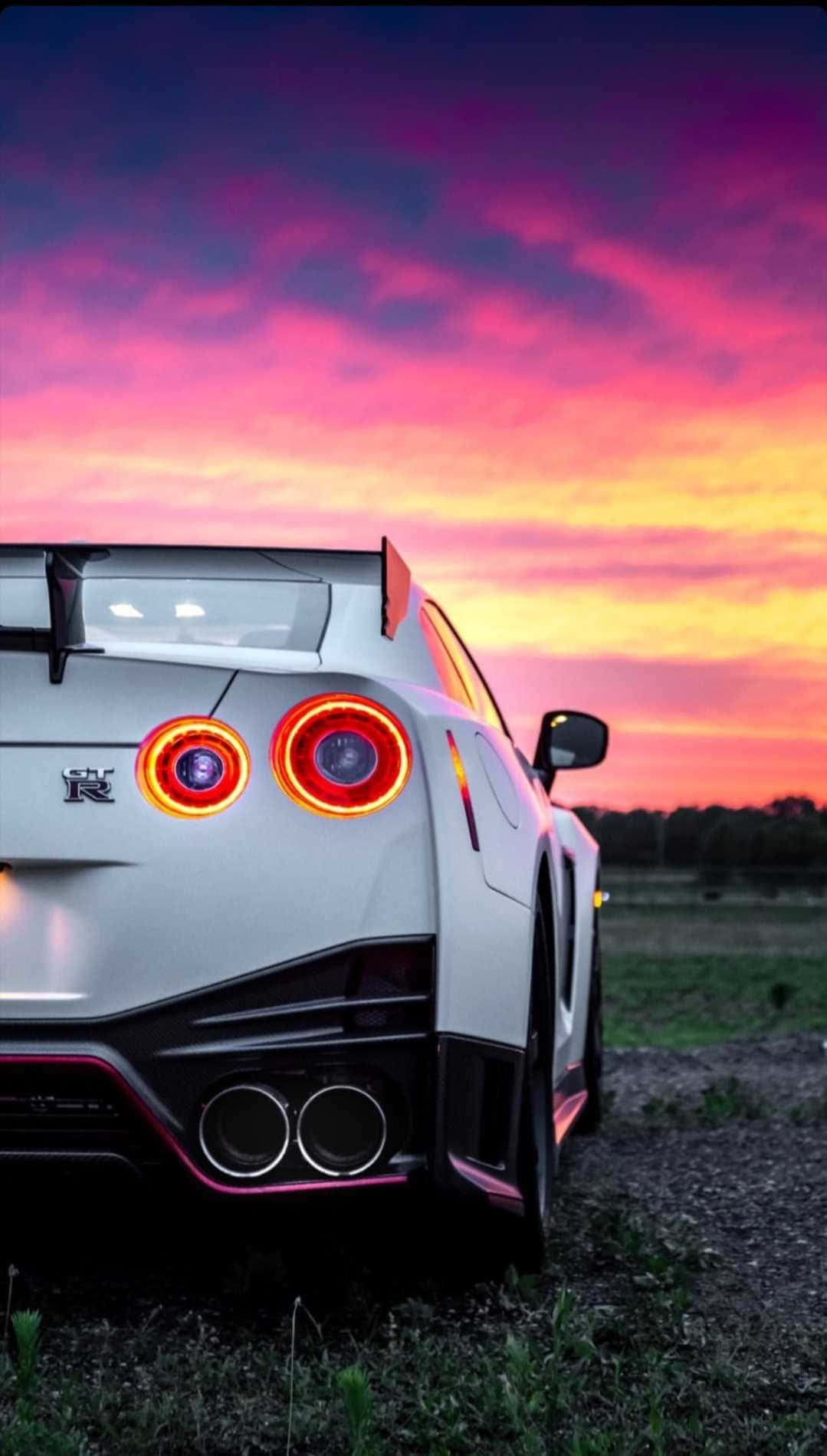 Nissan Gtr: A Powerful Driving Machine Background