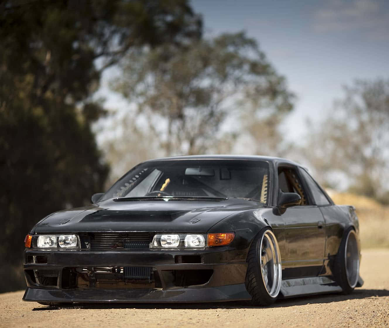 Nissan Silvia S13 - An Iconic Japanese Sports Car Background