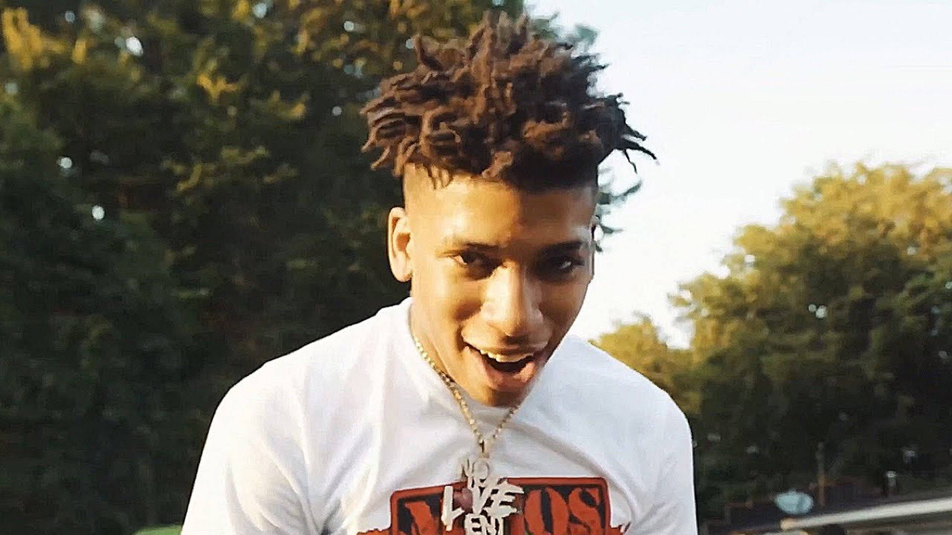 Nle Choppa Brings His Signature Style To The Music Industry Background
