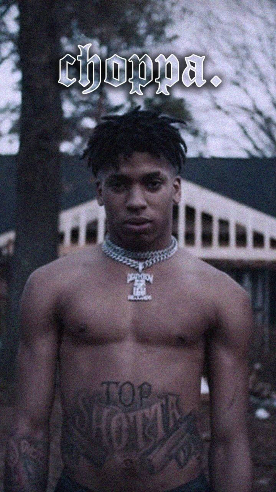 Nle Choppa Topless With Chains On Background
