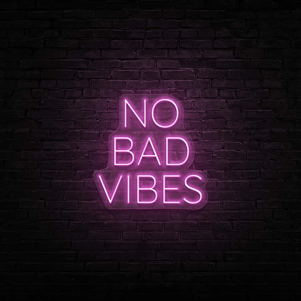 No Bad Vibes Neon Sign On Brick Wall