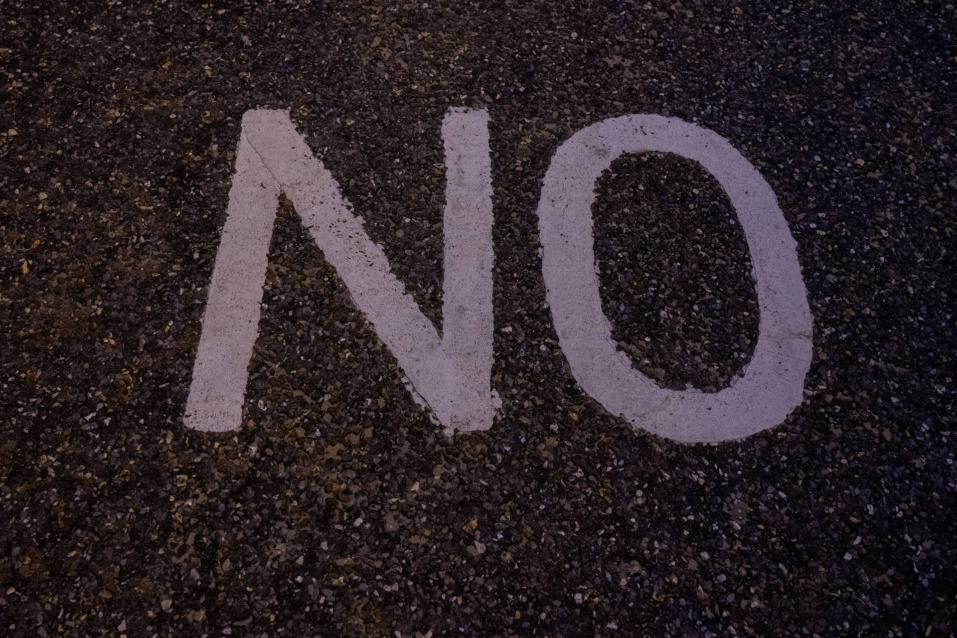 “no” Painted On A Concrete Surface