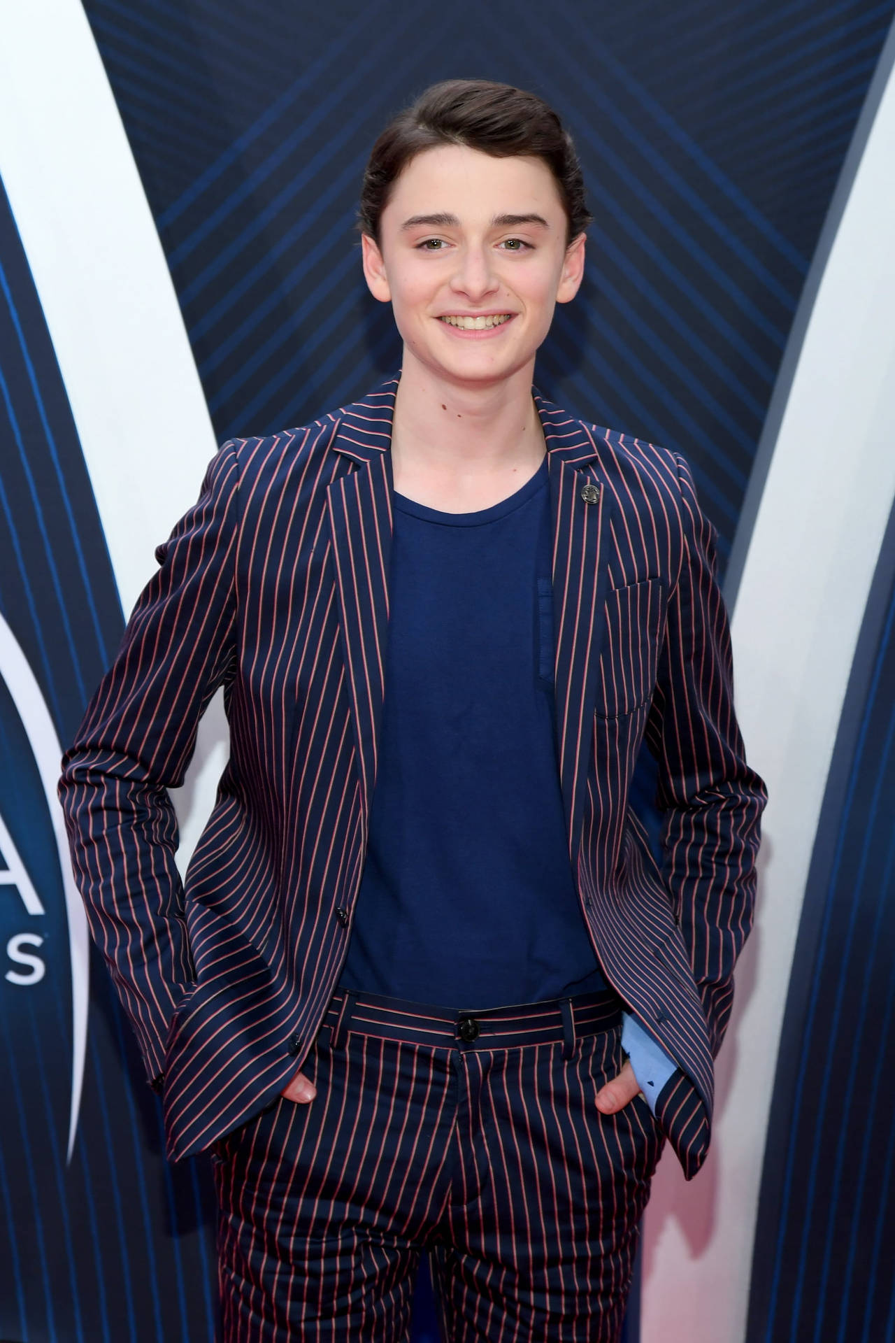 Noah Schnapp Wearing Striped Suit